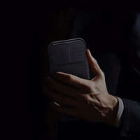 Nillkin CamShield Pro viedtālruņa apvalks iPhone 16 Pro Max ar kameras vāciņu - melns