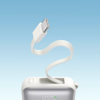 Joyroom JR-PBF27 10000mAh 22.5W portatīvais lādētājs ar iebūvētiem USB-C un Lightning kabeļiem - balta