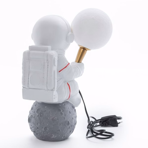 Mēness galda lampa ASTRONAUTS sēdošs Art Deco (modelis 4) AMTL