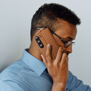 Dux Ducis Skin X2 viedtālruņa apvalks Samsung Galaxy S23+ atverams apvalks ar maku un statīvu brūns