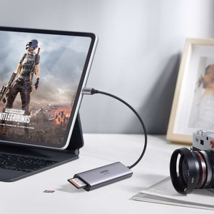 Ugreen daudzfunkcionāls HUB USB Type C - 3x USB 3.2 Gen 1 / HDMI 4K 60Hz / SD un TF karšu lasītājs pelēks (60383 CM511)