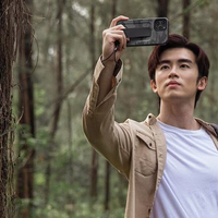 Uniq Heldro viedtālruņa apvalks iPhone 12 / iPhone 12 Pro - melns kamuflāža