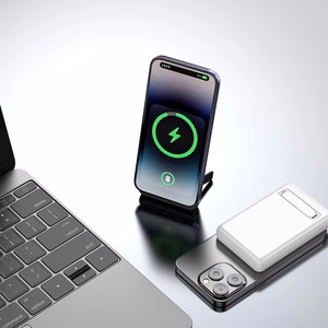 Dudao K14S+ 10000 mAh 22,5 W magnētiskā ārējā baterija USB-A + USB-C, saderīga ar MagSafe, ar statīvu, balta