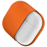 Uniq Nexo AirPods 4 + ausu āķu silikona apvalks - oranžs