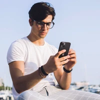 Spigen Glas.tR EZ Fit Optik Kameras aizsargstikls iPhone 14 / Plus / 15 / Plus - melns 2 gab