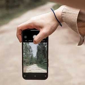 Uniq Heldro viedtālruņa apvalks iPhone 12 Pro Max - melns kamuflāža