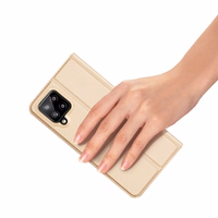 Dux Ducis Skin Pro grāmatas tipa apvalks Samsung Galaxy A22 4G zelta krāsas