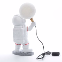 Mēness galda lampa ASTRONAUTS stāvošs Art Deco (modelis 1) AMTL