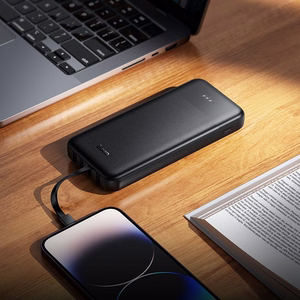 Portatīvais lādētājs Hoco 10000 mAh 2A ar četriem iebūvētiem kabeļiem USB A + USB C + Lightning + Micro USB J163 melns
