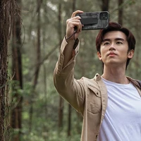 Uniq Heldro viedtālruņa apvalks iPhone 12 Pro Max - melns kamuflāža