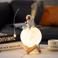 Mēness galda lampa / mitrinātājs ASTRONAUTS sēdošs Art Deco (modelis 5) AFSH