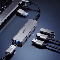 Orico YSB4-U2 USB-A/USB-C Hub dokstacija 2x USB-A 2.0 + 1x USB-A 3.0 + 1x USB-C 2.0 + 1x USB-C - pelēka