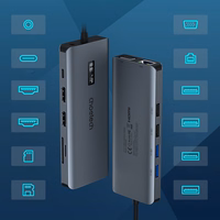 Choetech daudzfunkcionāls HUB ar displeju 12in1 USB-C uz USB-C / USB-A / HDMI / VGA / AUX / SD / TF pelēks (HUB-M26)
