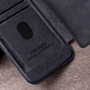 Nillkin Qin Pro viedtālruņa apvalks Samsung Galaxy S25 Ultra ar vāciņu un kameras pārsegu - Melns