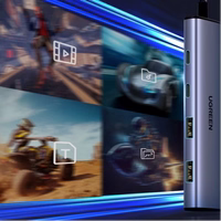 Adapteris Ugreen "CM473" (ievade: "Type-C" / izvade: 2x "USB"; 2x "Type-C")