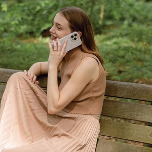 Uniq Coehl Terrazzo viedtālruņa apvalks iPhone 14 Pro - smilšu