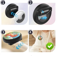 AirTag nozīmītes apvalks - melns ar dinozauru apdruku