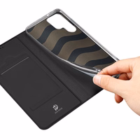 Dux Ducis Skin Pro Viedtālruņa apvalks Samsung Galaxy S23 Ultra ar atveramu kartiņu maku un statīvu Melns