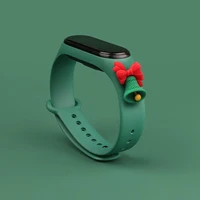 Siksna Xmas Xiaomi Mi Band 3 / 4 Ziemassvētku silikona siksna aproce ar zvaniņu - tumši zaļa