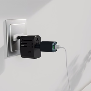 Pasaules ceļojumu GaN 70W adapteris ar maciņu