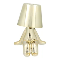 Galda lampa pie gultas GOLD MAN Art Deco sēdoša (versija 6) MLTL