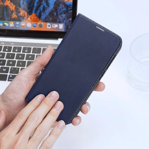 Dux Ducis Skin X2 viedtālruņa apvalks Samsung Galaxy S23+ atverams apvalks ar maku un statīvu zils