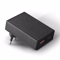 UNIQ Sienas lādētājs Votre Slim Duo 20W USB-C + USB-A melns/charcoal melns