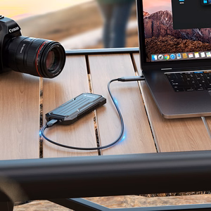 Orico OXS2C3-G2 M.2 NVMe/SATA SSD USB-C 3.2 taktiskais pastiprināts disku ietvars - pelēks
