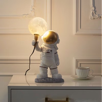 Mēness galda lampa ASTRONAUTS stāvošs Art Deco (modelis 1) AMTL
