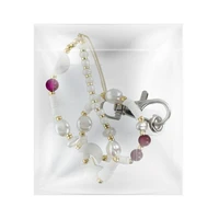 SHELLS tālruņa siksniņa, piekariņš / auklas garums 44 cm (22 cm cilpā) / uz rokas – balts un violets