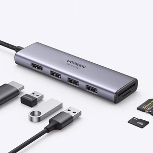 Ugreen daudzfunkcionāls HUB USB Type C - 3x USB 3.2 Gen 1 / HDMI 4K 60Hz / SD un TF karšu lasītājs pelēks (60383 CM511)