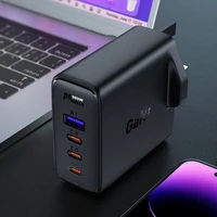 Ātrais GaN 100W Power Delivery lādētājs 3x USB C 1x USB ar Lielbritānijas spraudni - melns