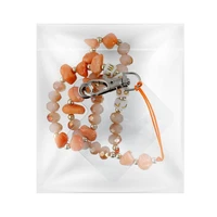 LOVE tālruņa siksniņa, piekariņš / auklas garums 44 cm (22 cm cilpā) / uz rokas – oranžs