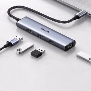 Adapteris Ugreen 2-in-1 sudrabs (ievade: Type-C / izvade: 4-USB)