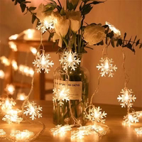Lampki choinkowe LED snowflake/star -    3m/20 lampek ciepłe białe/warm balts zasilane bat. 3xAA EHD-LS04