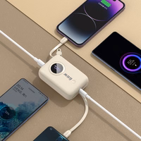 Portatīvais lādētājs Dudao K14 10000mAh ar USB-C / Lightning kabeļiem (smilškrāsas)