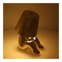 Galda lampa pie gultas GOLD MAN Art Deco sēdoša (versija 4) MLTL