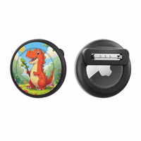 AirTag nozīmītes apvalks - melns ar dinozauru apdruku