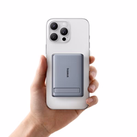 Baseus PicoGo AM31 Qi2 5000mAh 20W īpaši plāns MagSafe saderīgs portatīvais lādētājs ar statīvu un Baseus Simple USB-C 20cm pītu kabeli - pelēks