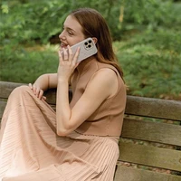 Uniq Coehl Terrazzo viedtālruņa apvalks iPhone 14 Pro - smilšu