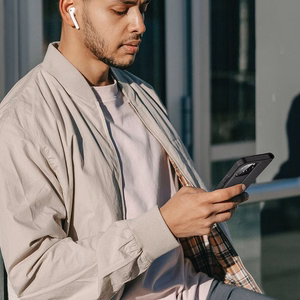 Dux Ducis Skin X2 viedtālruņa apvalks iPhone 14 Pro ar magnētisko atloku brūns