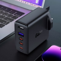 Ātrais GaN 100W Power Delivery lādētājs 3x USB C 1x USB ar Lielbritānijas spraudni - melns