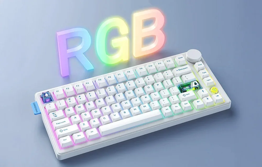 White keyboard on a blue table, with RGB lettering above it