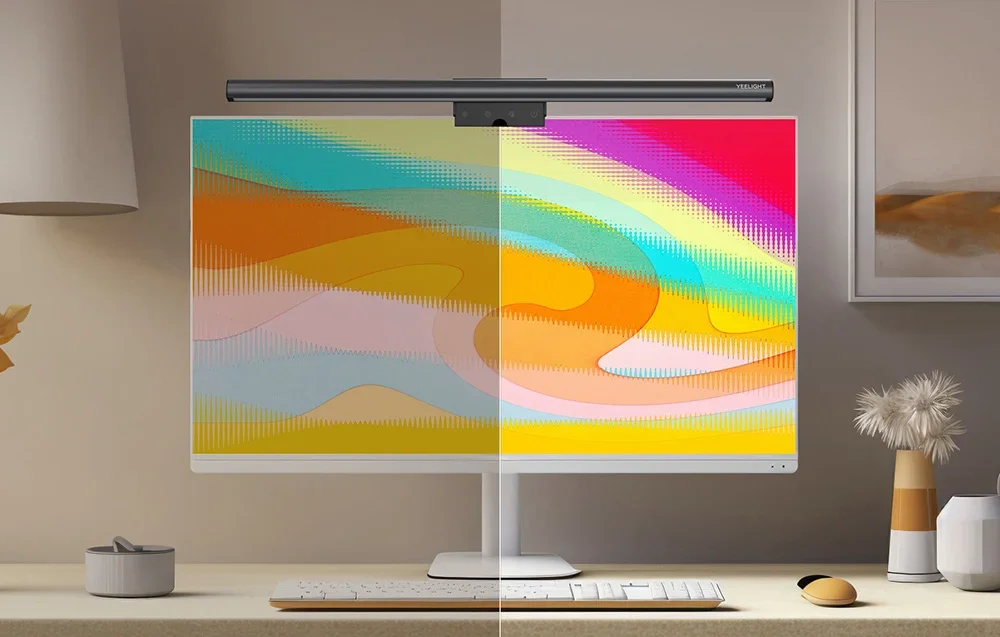 Monitor with backlighting from the overhead lamp, showing color comparison before and after color correction